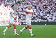 Ermedin Demirovic delte gladelig ut øl. Foto: Bernd Weissbrod/dpa via AP / NTB