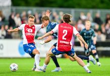Tromsø-trøbbelet fortsetter – solid start for Isnes i KFUM KFUMs Martin Tangen Vinjor og Tromsøs Jens Hjertø-Dahl under eliteseriekampen i fotball mellom KFUM Oslo og Tromsø på KFUM Arena. Foto: Annika Byrde / NTB